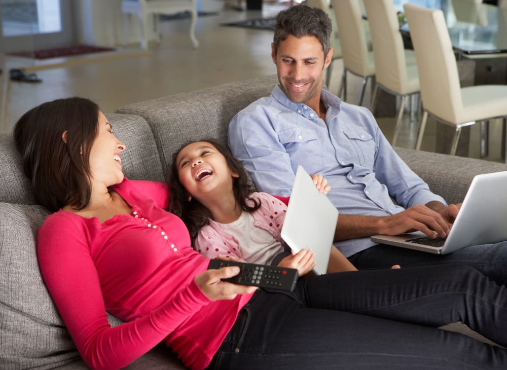 A family relaxing in a home at Capeharts East in San Diego, California