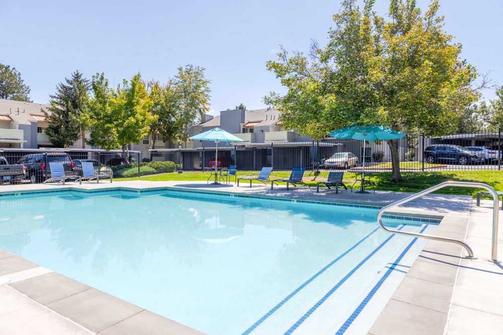 Luxury in-ground pool at The Lodge at McCarran Ranch Apartment Homes in Reno, Nevada