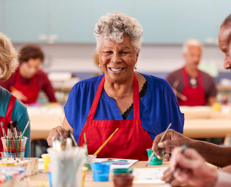 A resident taking an art class near The Fields at Arbor Glen in Lake Elmo, Minnesota