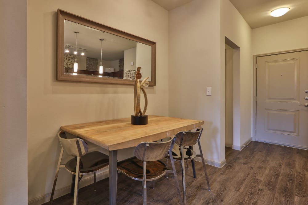 Cozy dining room space at Olympus at Waterside Estates in Richmond, Texas