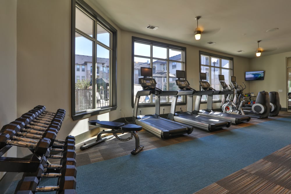 Treadmills in fitness center at Olympus at Waterside Estates in Richmond, Texas