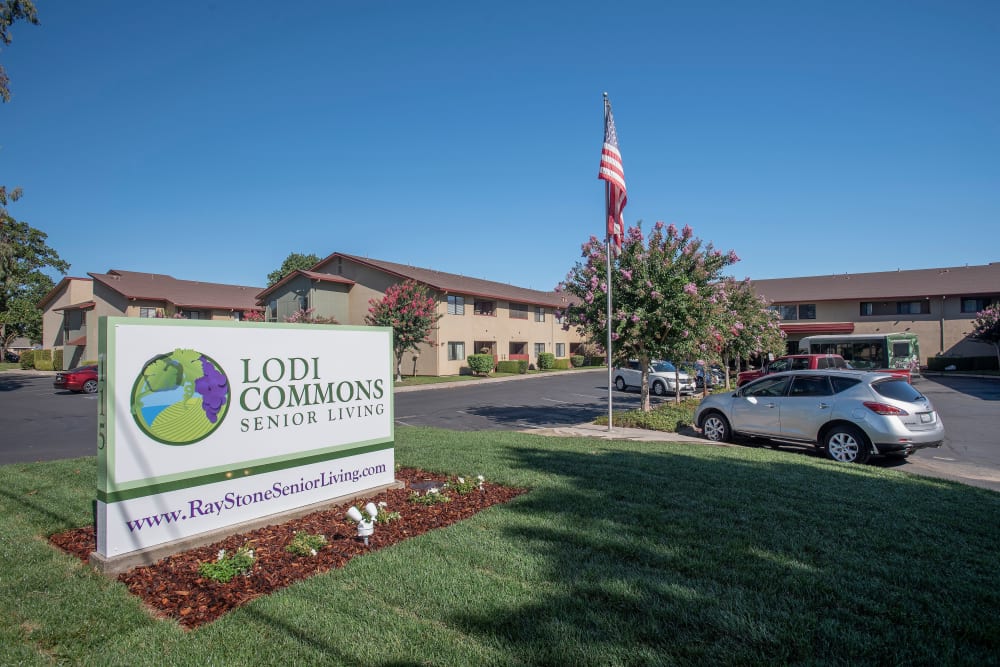 Entrance with landscaping at Lodi Commons Senior Living in Lodi, California