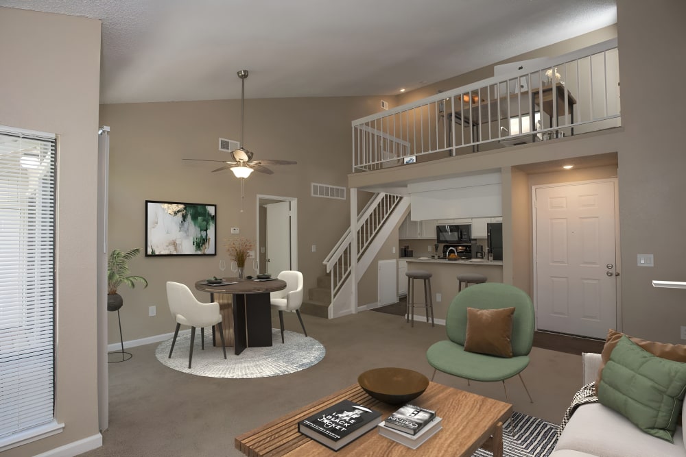 Living room area and loft at Huntcliffe Apartments in Fair Oaks, California