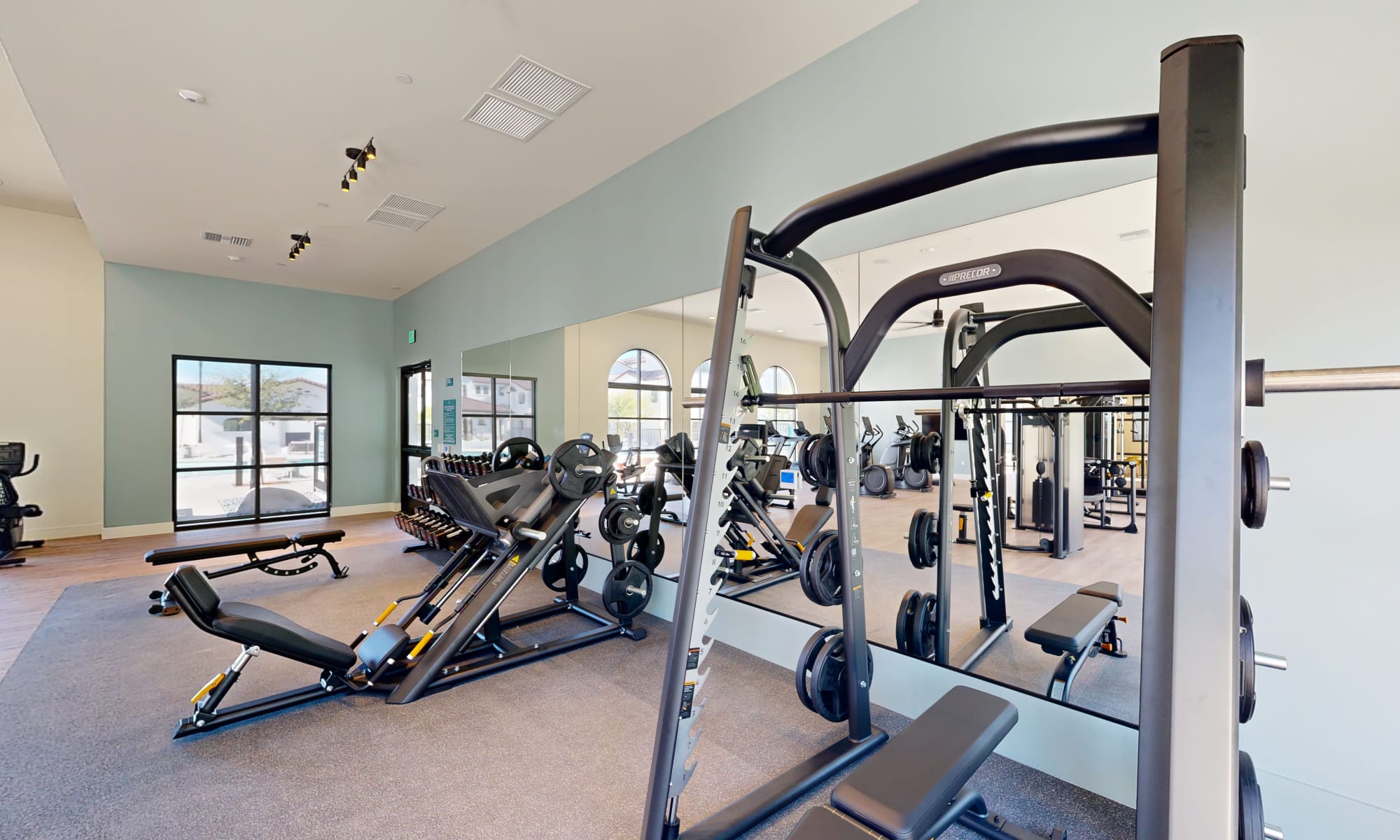 Fitness center with weight lifting equipment at The Villas at Anacapa Canyon in Camarillo, California
