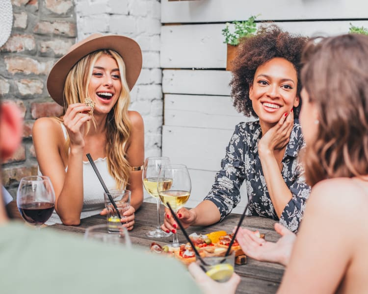 Residents catching up over a glass of wine near Vue Issaquah in Issaquah, Washington
