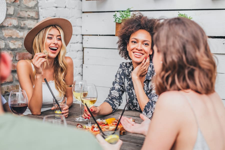 Resident friends out for drinks and appetizers near Sofi Berryessa in San Jose, California