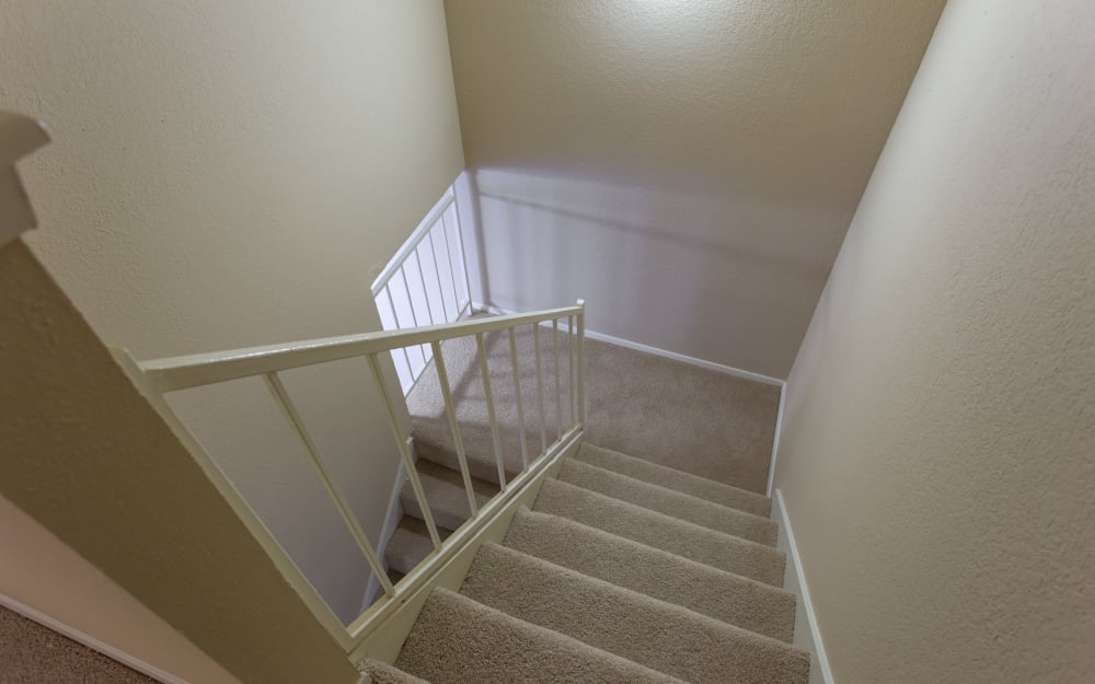 Stairwell with rails at Canopy on Central in Bedford, Texas