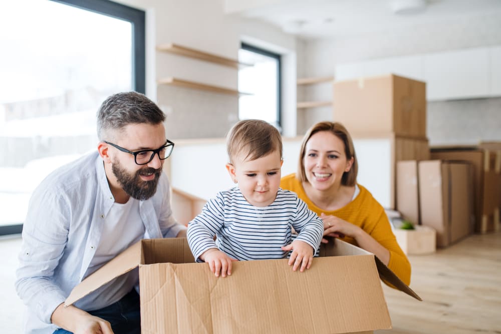 Family preparing items for storage in Saint Cloud, Florida at Storage Units