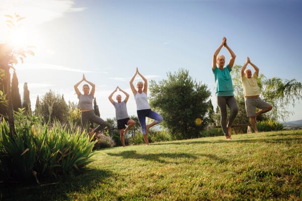 Group of residents doing yoga at Estoria Cooperative Lakeville in Lakeville, Minnesota