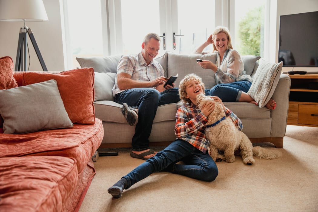 A family with their dog at Avilla Paseo in Phoenix, Arizona