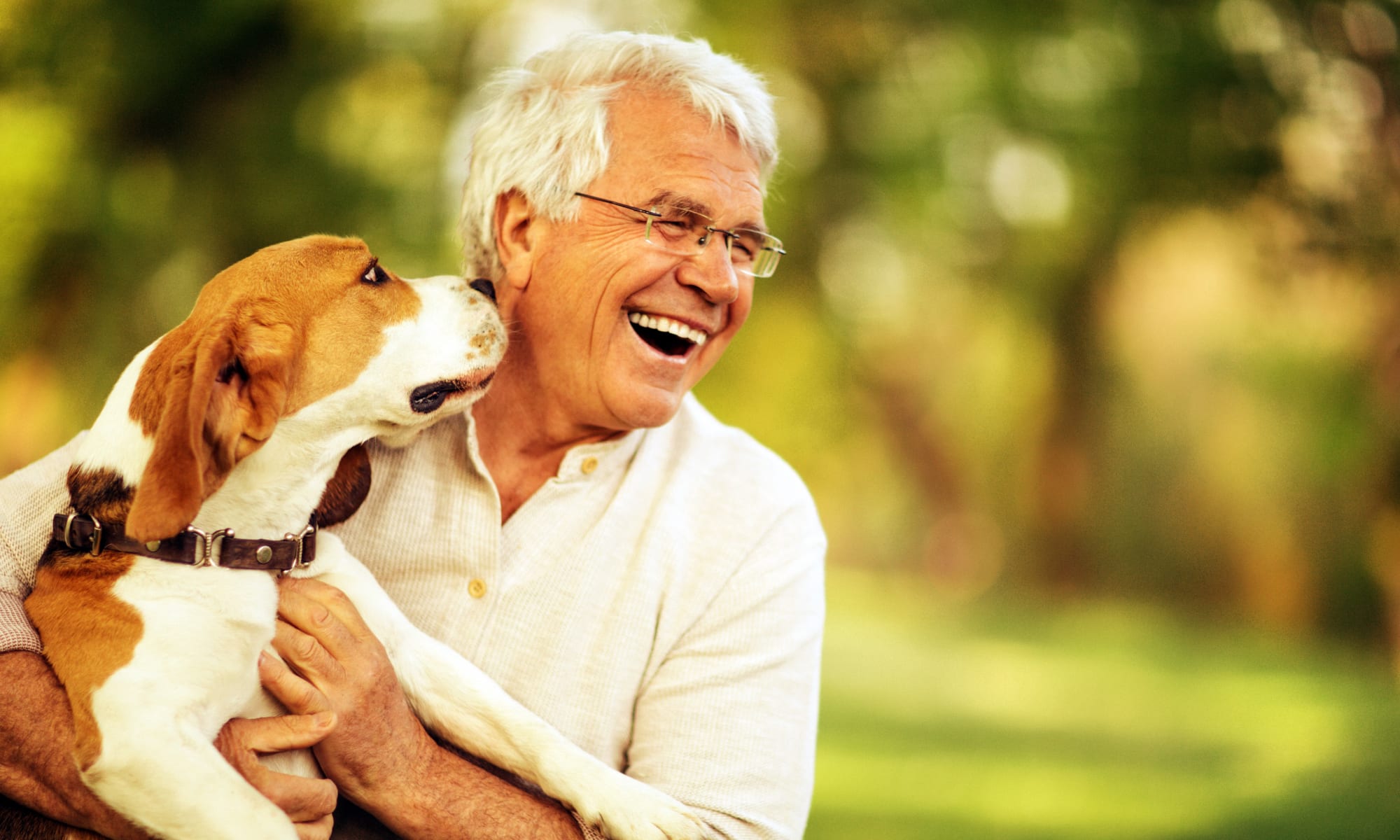 Man with a dog at Retirement Center Management in Houston, Texas