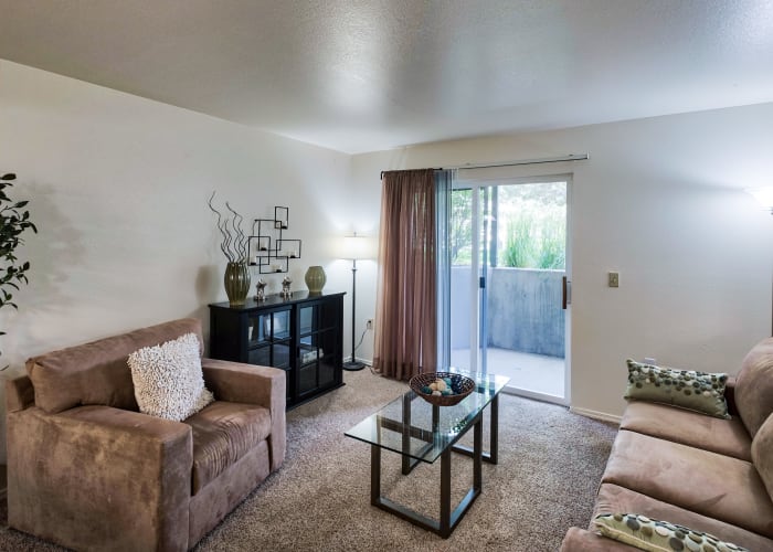 Bright living room at Arbor Crossing Apartments in Boise, 