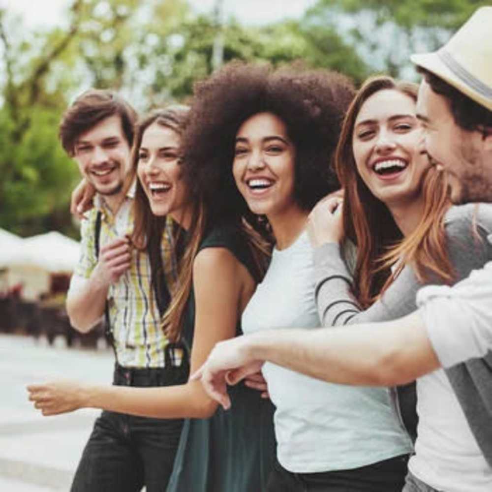 Happy residents outside at MacArthur Apartments in Oakland, California