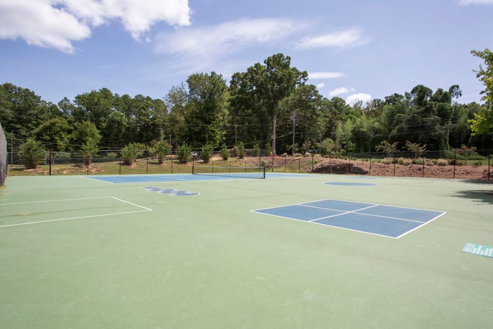 Expansive tennis courts at The Greens at Cascade Apartment Homes in Atlanta, Georgia