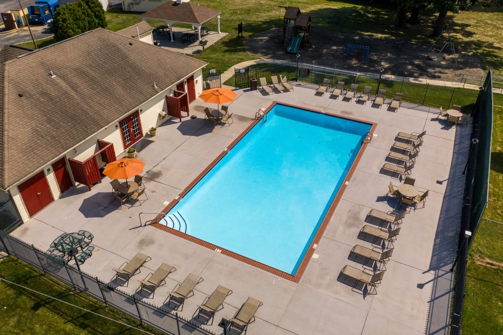 Outdoor swimming pool with chairs at Iron Ridge, Elkton, Maryland