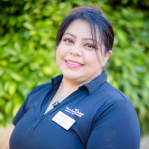 Teresa Hernandez, Wellness Mentor at Woodland Palms Memory Care in Tucson, Arizona. 