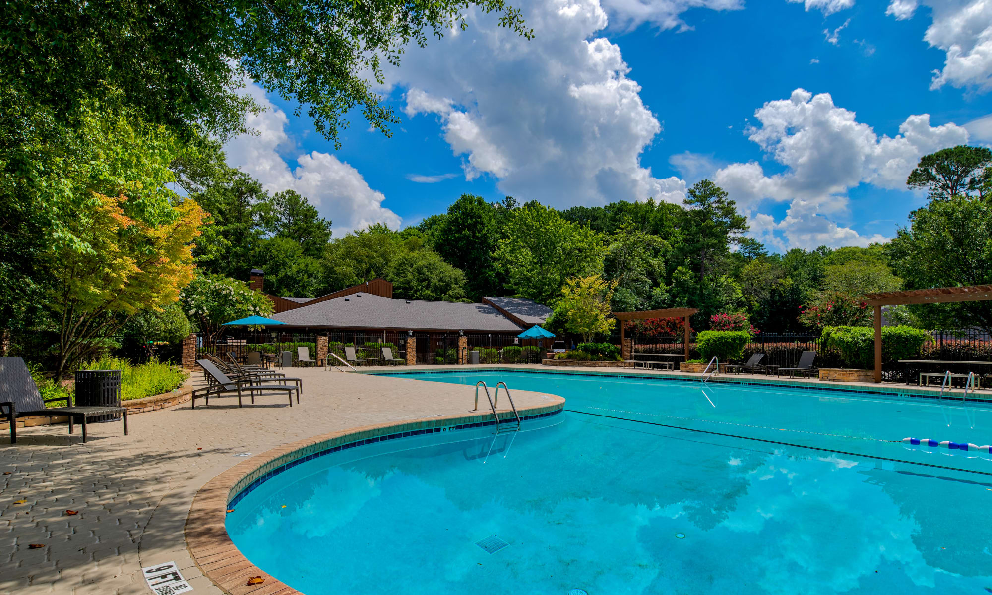 Swimming pool at The Lodge on the Chattahoochee Apartments in Sandy Springs, Georgia