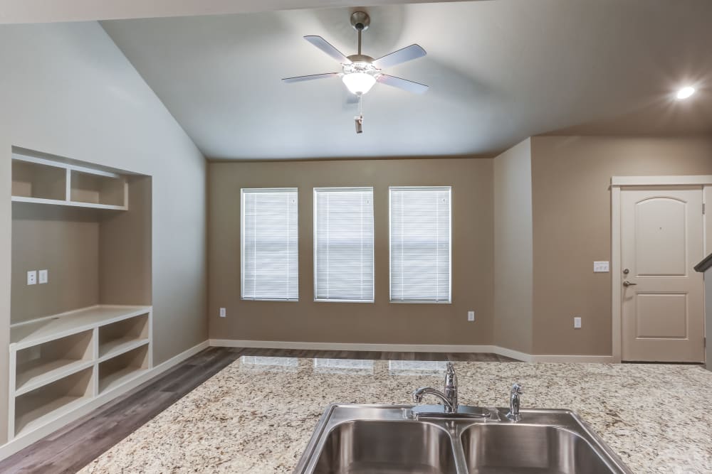 Kitchen island and windows at Cedar Park & Canyon Falls Townhomes in Twin Falls, Idaho