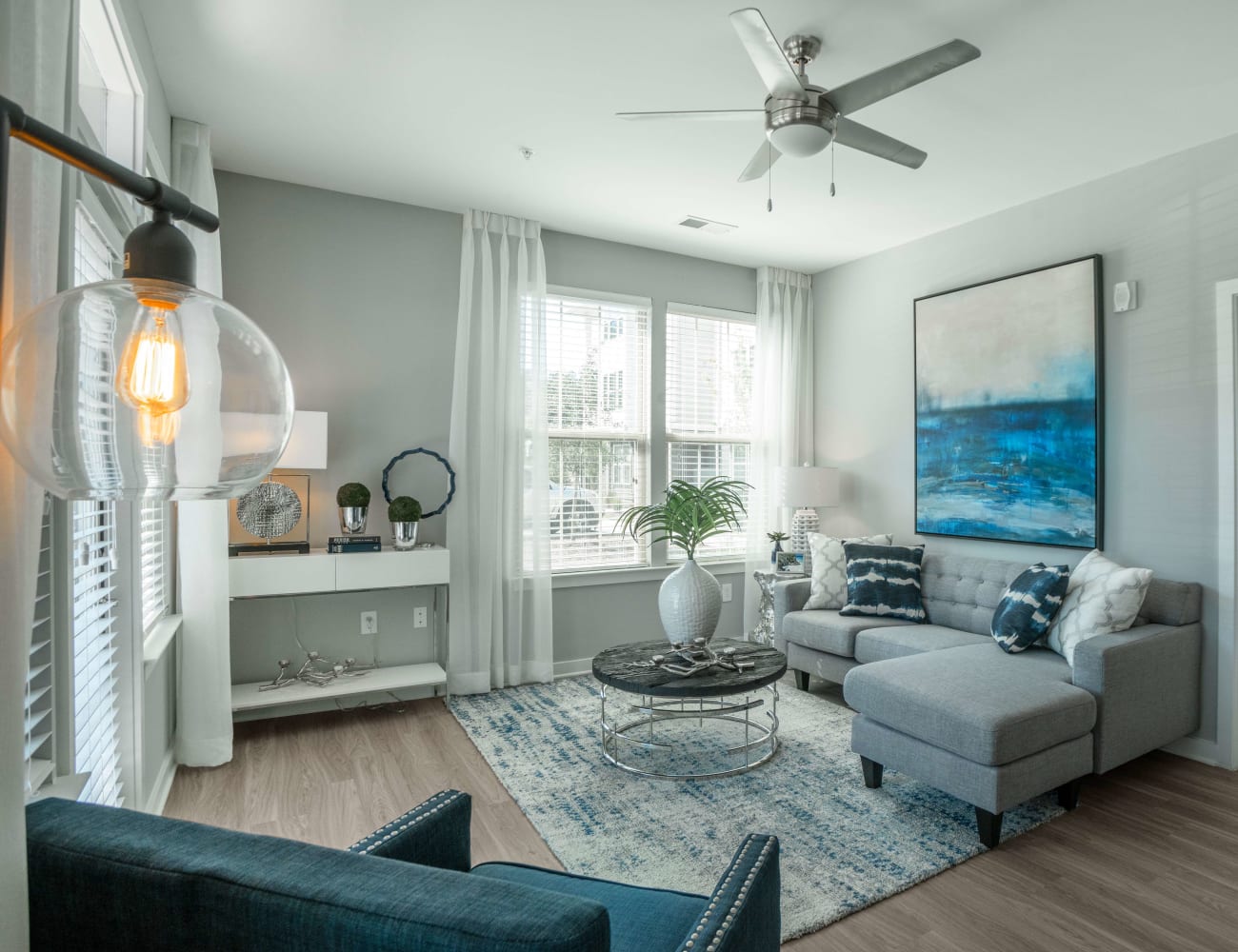 Open-concept layout with hardwood floors at Elevate at Brighton Park in Summerville, South Carolina