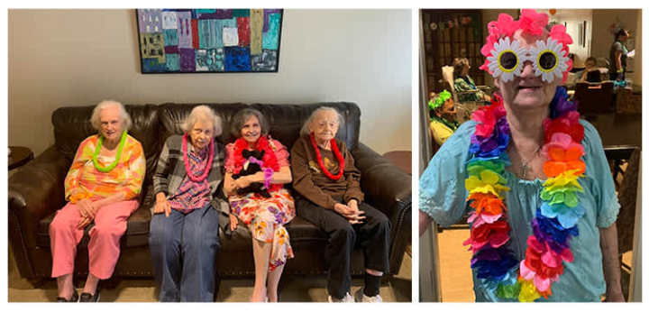 Residents dressed up in colorful Hawaiian Luau clothes and leis