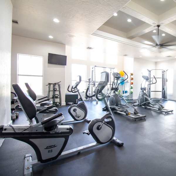 Modern fitness center with cardio machines at Sutton in Austin, Texas