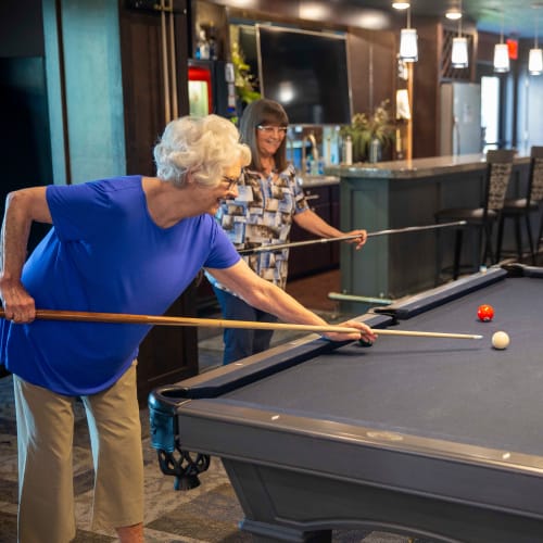 Residents playing pool at Attivo Trail in Ankeny in Ankeny, Iowa