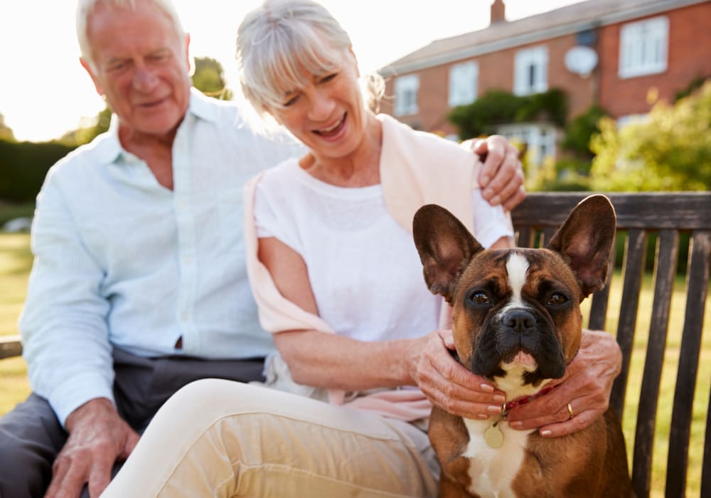 Residents sitting with dog near Holden Southcenter in Tukwila, Washington. 