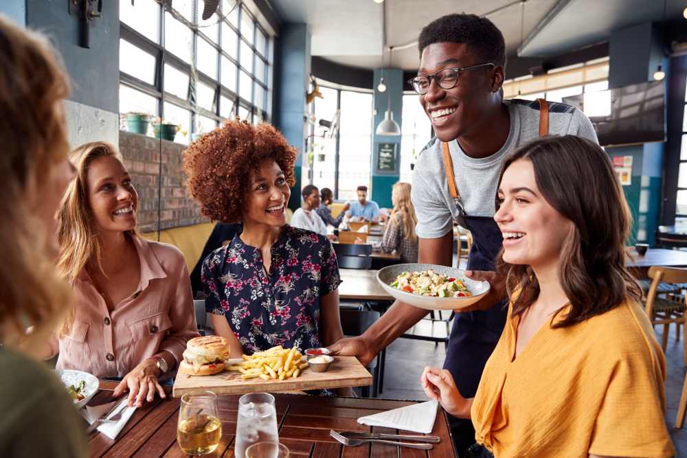 Friends enjoying food at a local restaurant in Buffalo Grove, Illinois