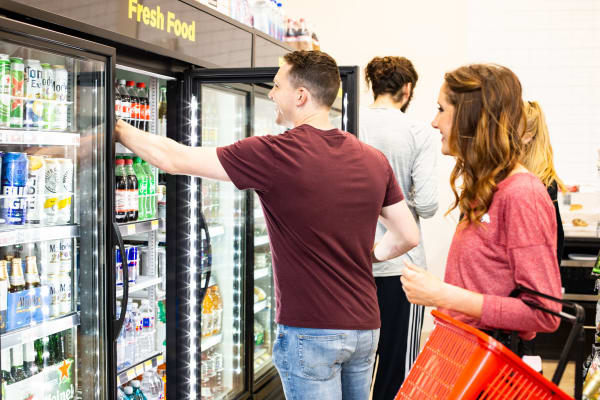 Woman shopping at convenient store at Mosaic Dallas
