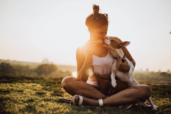 Resident hugging her dog at Vista Creek in Castro Valley, California