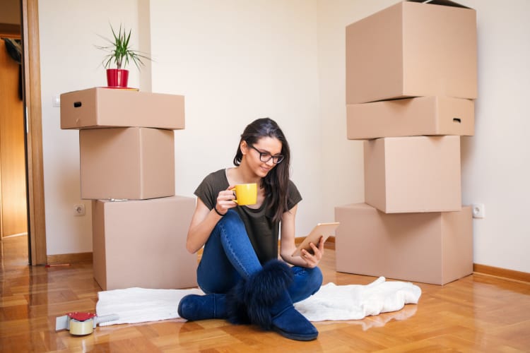 Woman reviewing storage solutions on her tablet for Storage Star Folsom in Folsom, California