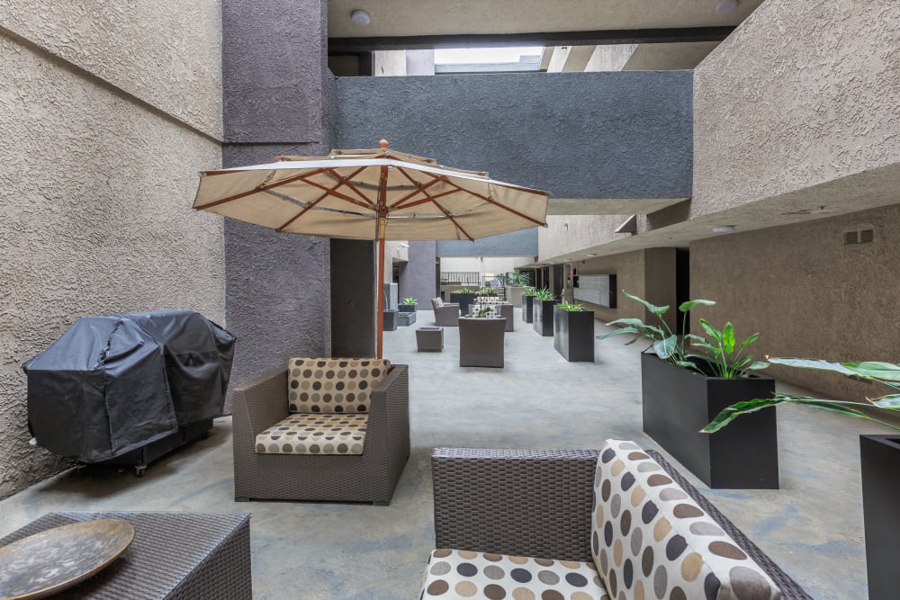 Outdoor patio seating at Club Marina Apartments in Los Angeles, California