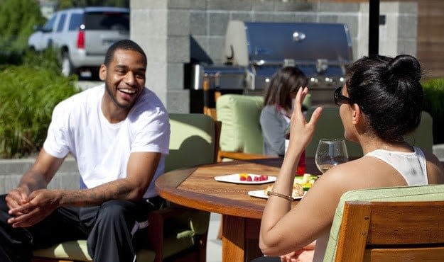 Man and woman at a BBQ at Montessa in Portland, Oregon