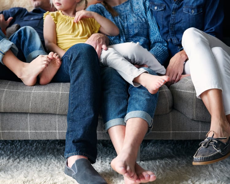 Family's happy feet in their new home at Vue Issaquah in Issaquah, Washington