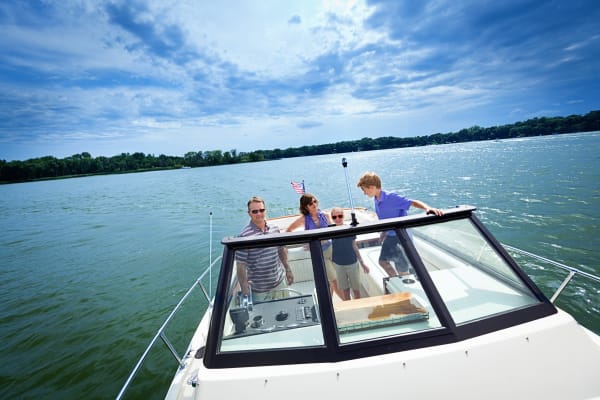 A family on a boat near Best American Storage in Lake Wales, Florida