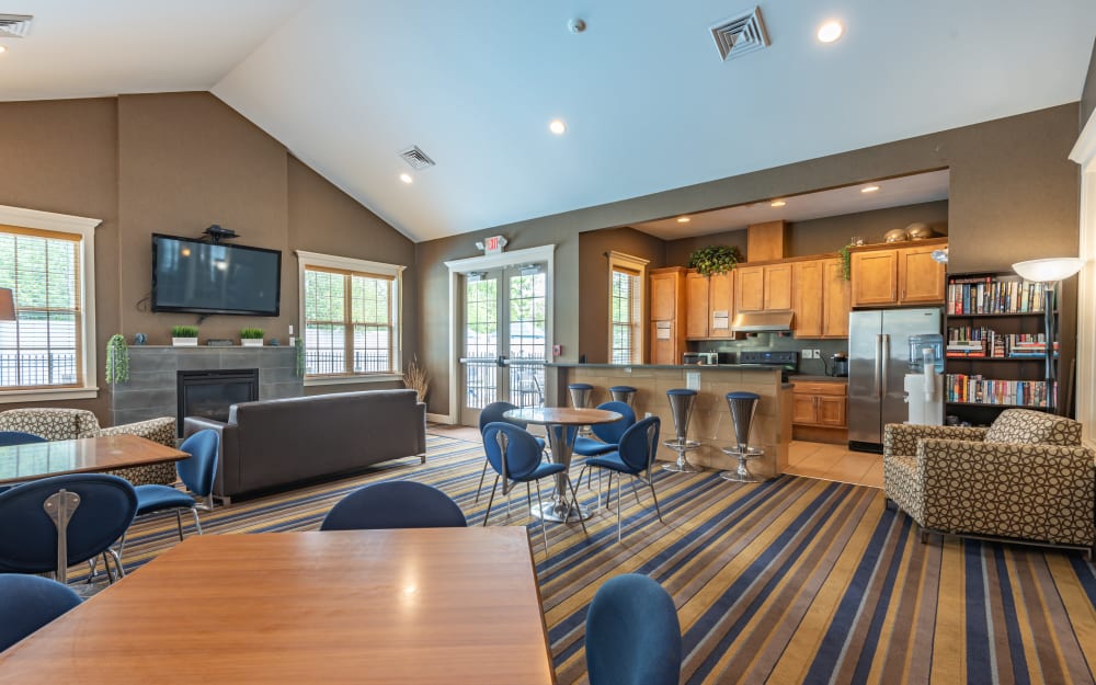 Resident clubhouse with a kitchen at North Ponds Apartments & Townhomes in Webster, New York.