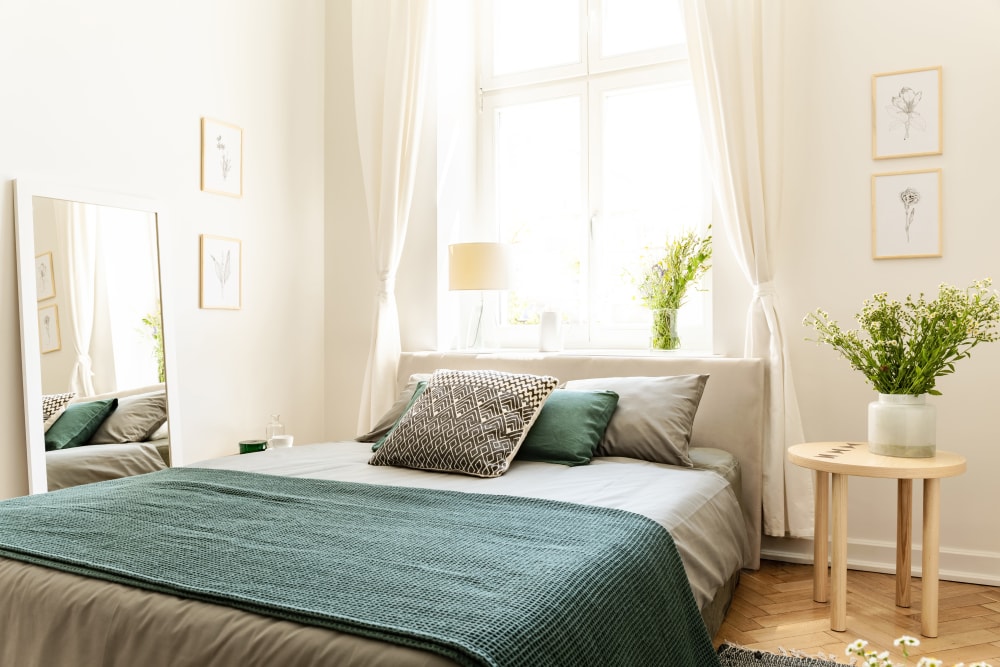 A warm apartment bedroom at Constellation in Huntsville, Alabama