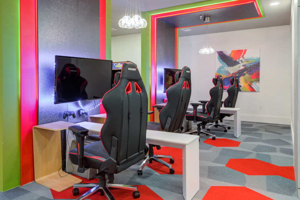 Modern gaming station at Celsius Apartments in Charlotte, North Carolina managed by Hercules Living.