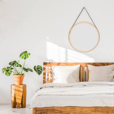 A well-lit bedroom in a home at Prospect View in Santee, California