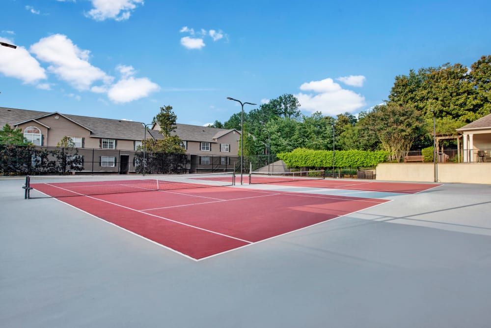 Well maintained tennis courts for resident use at Avia at North Springs in Atlanta, Georgia