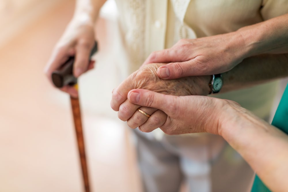 Staff helping resident at Ramsey Village Continuing Care in Des Moines, Iowa