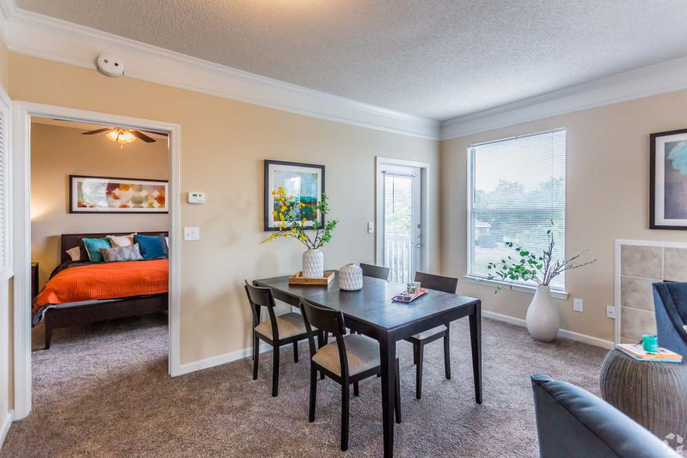 living room with carpet and fireplace