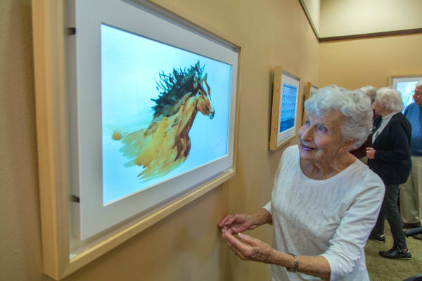 Seniors living a happy life here at Merrill Gardens at Carolina Park