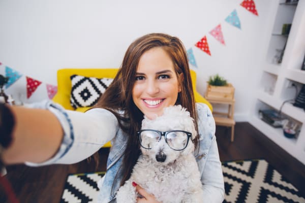 Woman and her adorable dog at Mercury NoDa in Charlotte, North Carolina