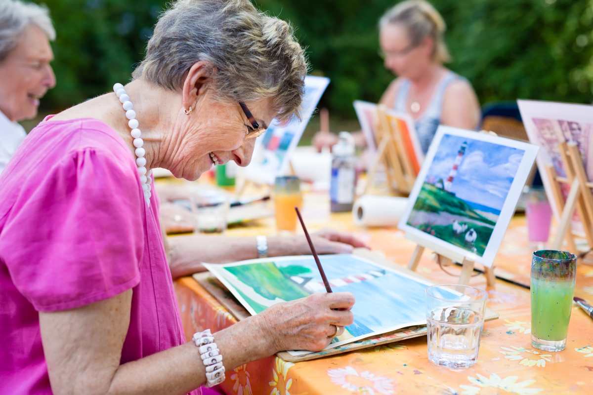 Resident painting at Keystone Place at Beachwalk in Fort Myers, Florida
