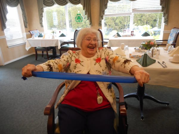 A resident in a fitness class at Patriots Glen in Bellevue, Washington. 