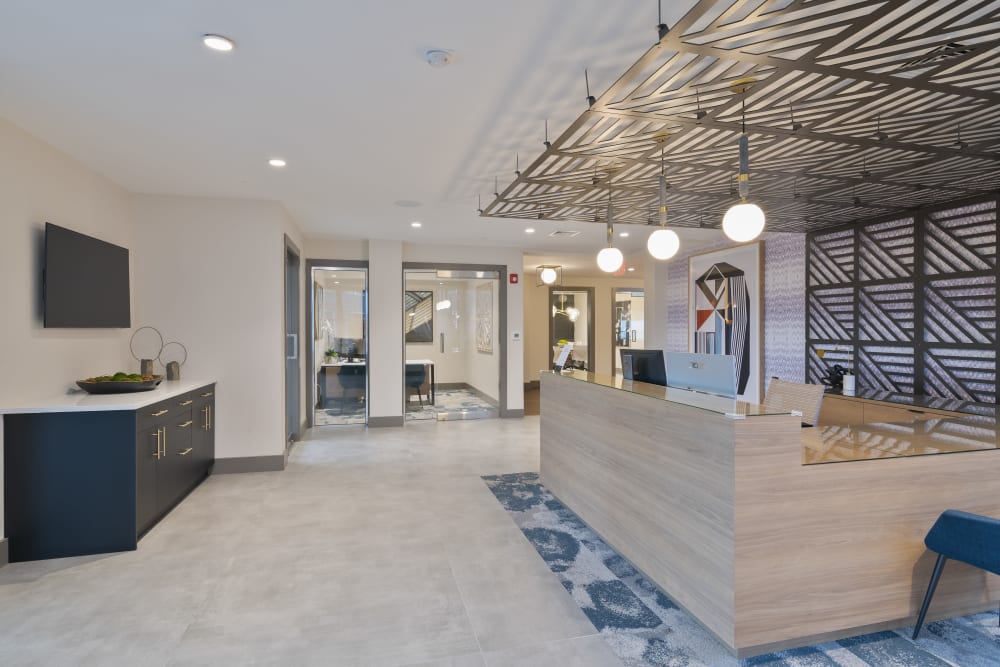 Open layout kitchen and dining space at Sofi at Morristown Station in Morristown, New Jersey
