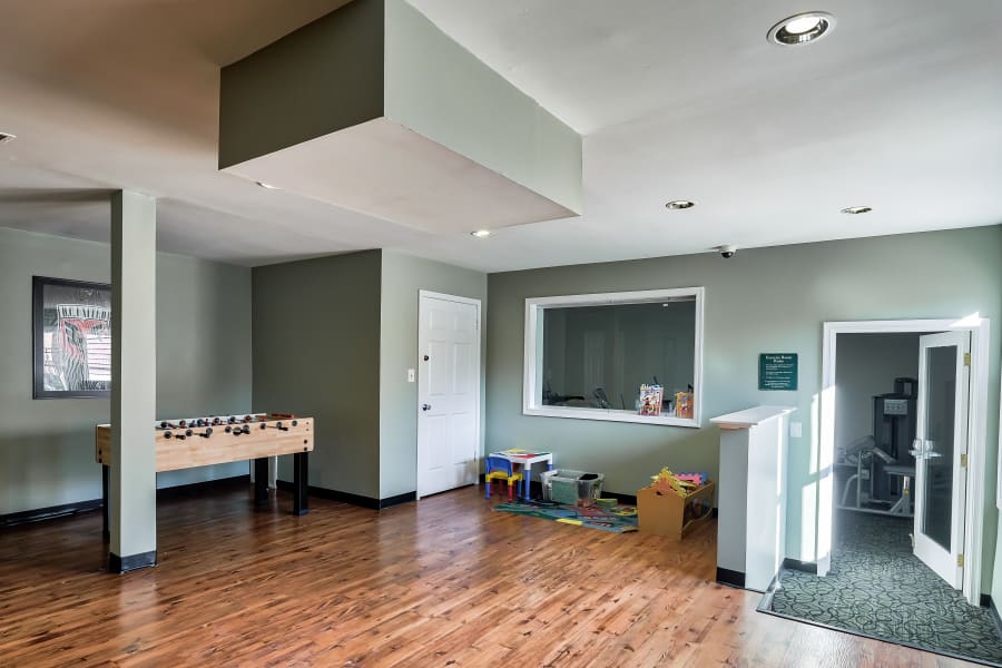 Game room at Abbotts Run Apartments in Alexandria, Virginia.