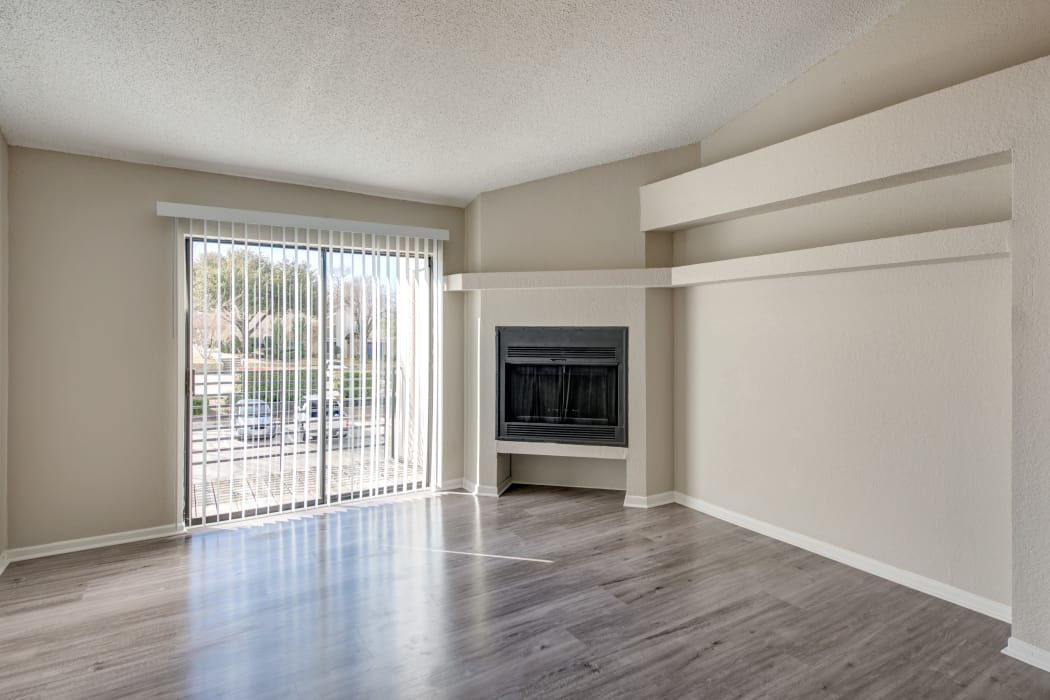 Bright and open floor plan with hardwood floors at The Belmont in Grand Prairie, Texas