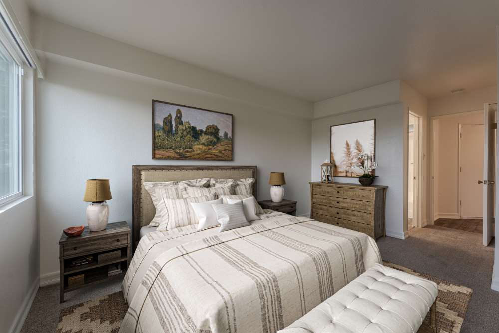 A well-lit main bedroom at Beech St. Knolls in San Diego, California